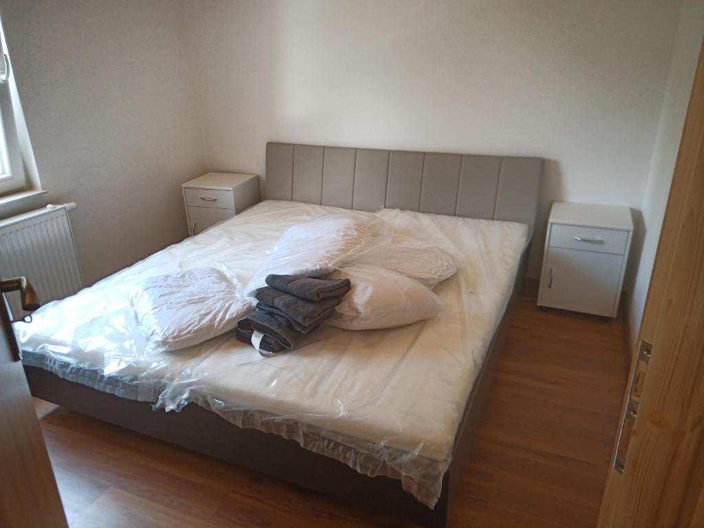 Postel nebo postele na pokoji v ubytování Na červené louce relax Líbá 6
