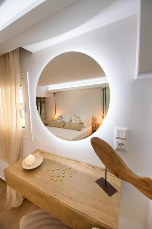 Postel nebo postele na pokoji v ubytování LEFKAS CITY APARTMENTS & Suites