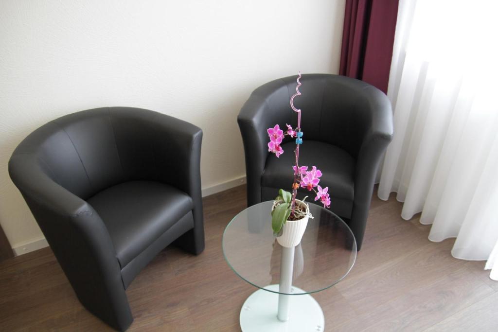 Posezení v ubytování Apado-Hotel garni