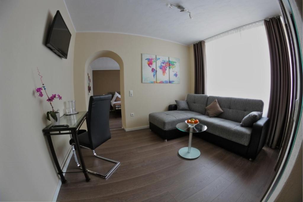 Posezení v ubytování Apado-Hotel garni
