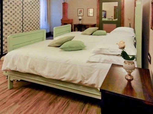 Postel nebo postele na pokoji v ubytování La Patirana Guesthouse