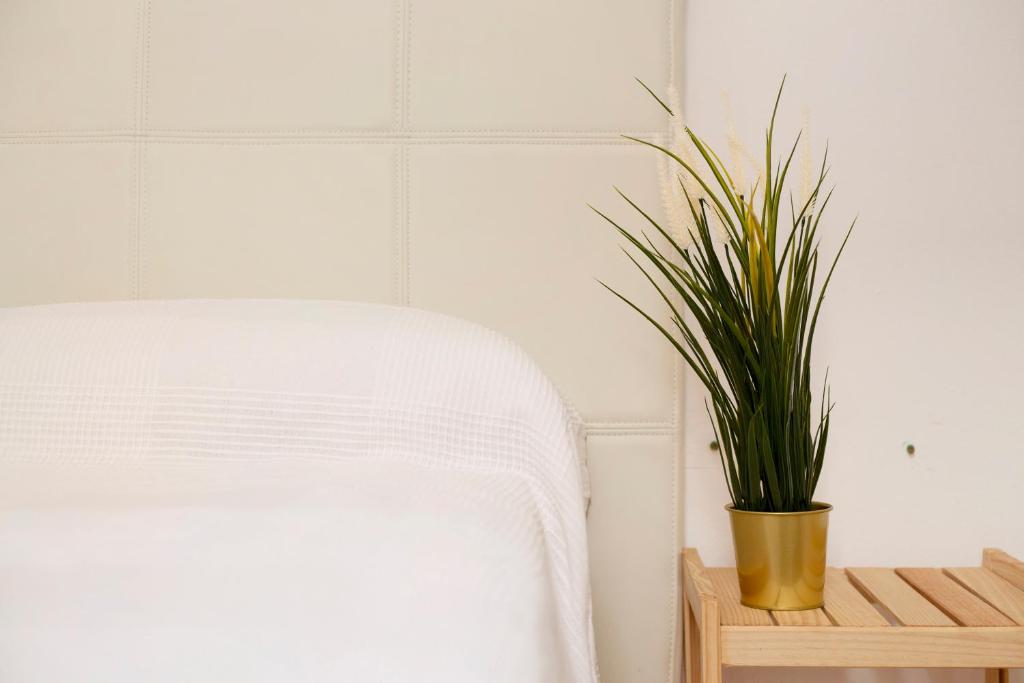 A bed or beds in a room at Apartamento Playa Morro Jable 2c