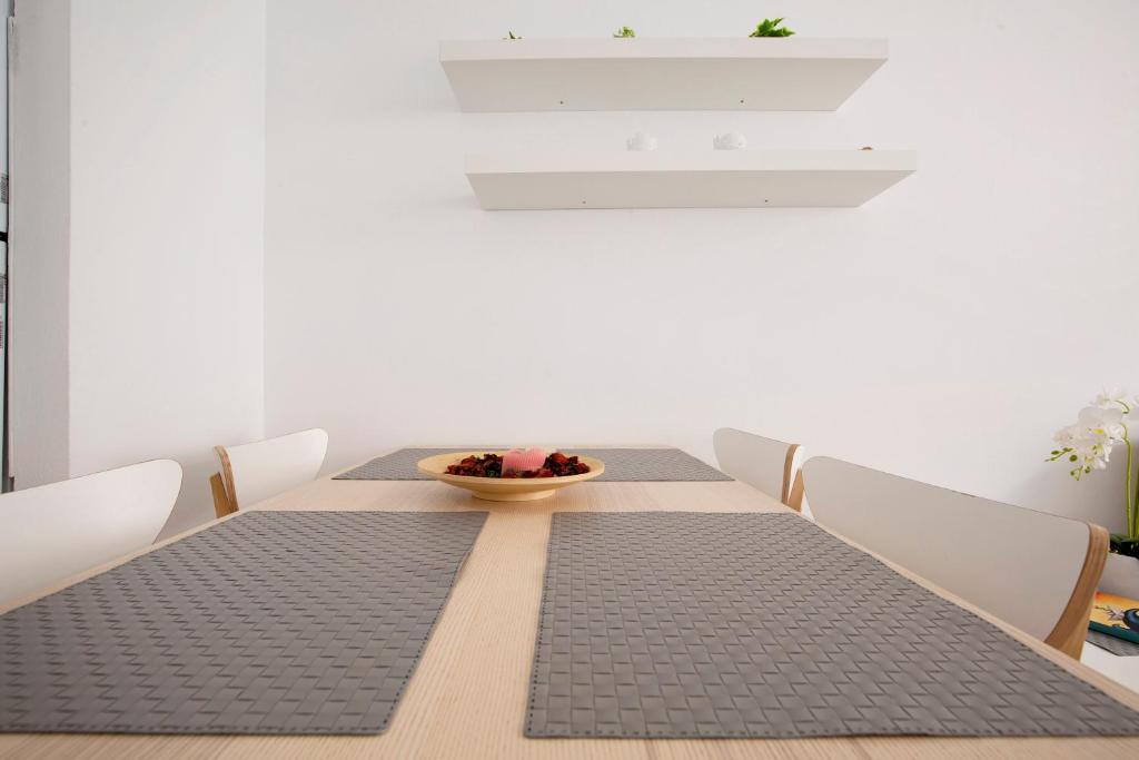 A bed or beds in a room at Apartamento Playa Morro Jable 2c