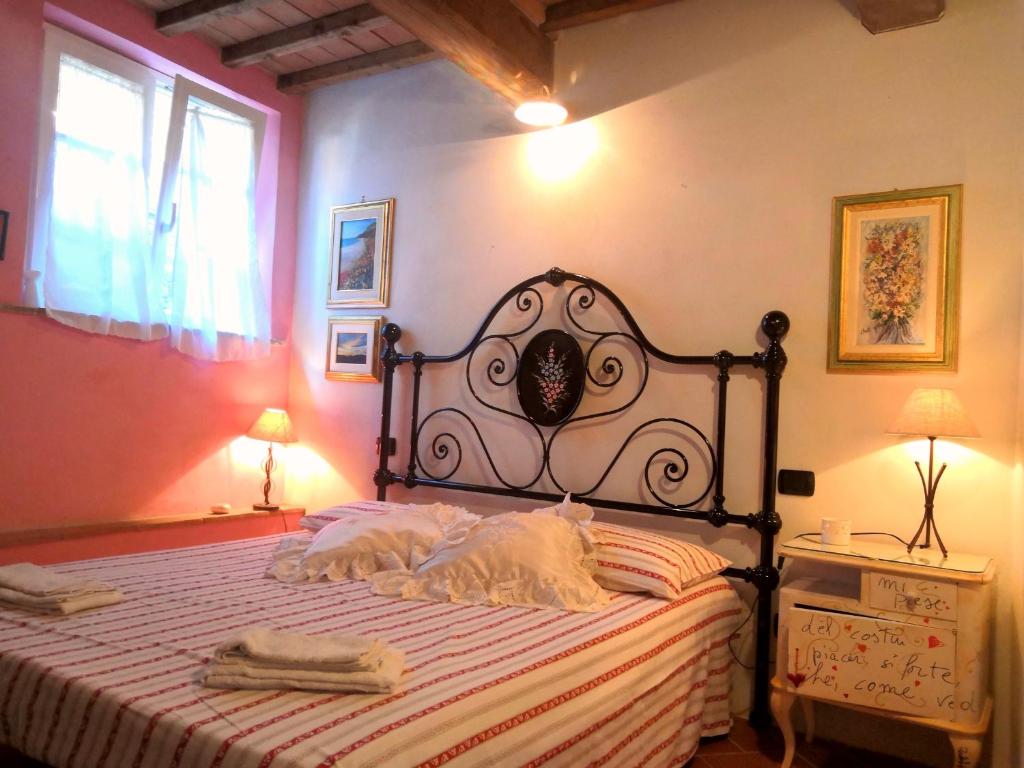 Cama o camas de una habitación en Il Colle Calci