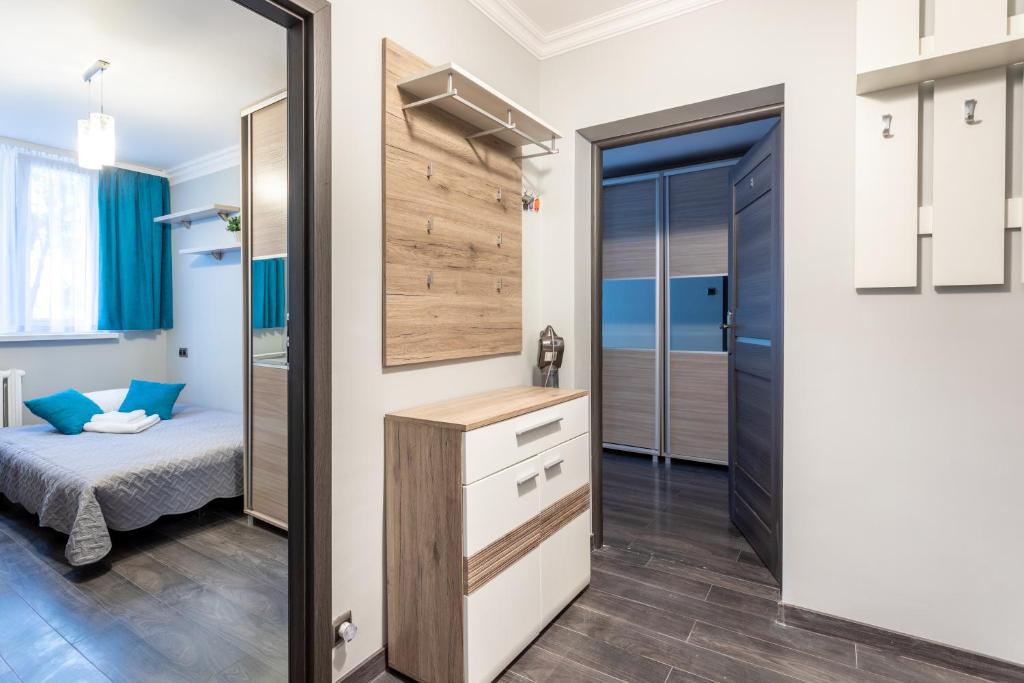 Posteľ alebo postele v izbe v ubytovaní 3 Bedrooms Comfy Flat Celarowska