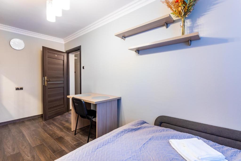Posteľ alebo postele v izbe v ubytovaní 3 Bedrooms Comfy Flat Celarowska