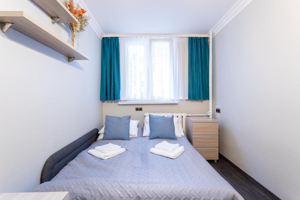Posteľ alebo postele v izbe v ubytovaní 3 Bedrooms Comfy Flat Celarowska