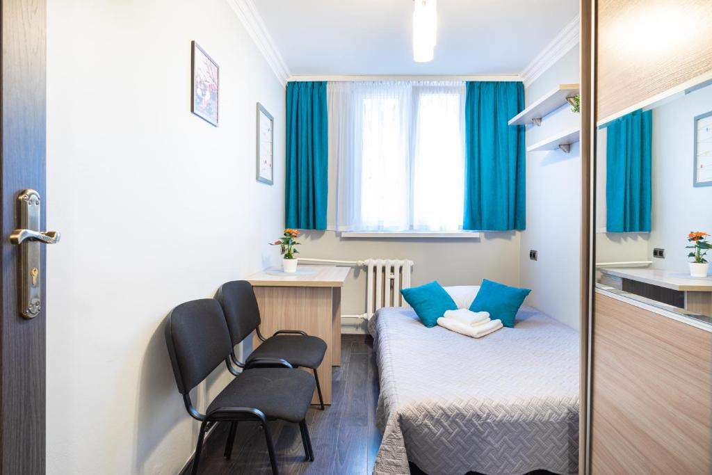 Posteľ alebo postele v izbe v ubytovaní 3 Bedrooms Comfy Flat Celarowska