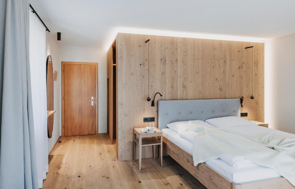 Postel nebo postele na pokoji v ubytování Hotel Alpenrose