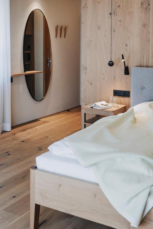 Postel nebo postele na pokoji v ubytování Hotel Alpenrose