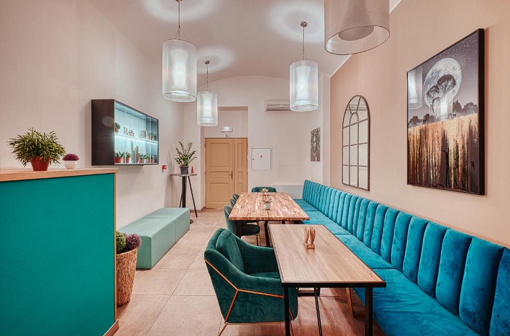 TV a/nebo společenská místnost v ubytování Salvator Boutique Hotel vegan-friendly