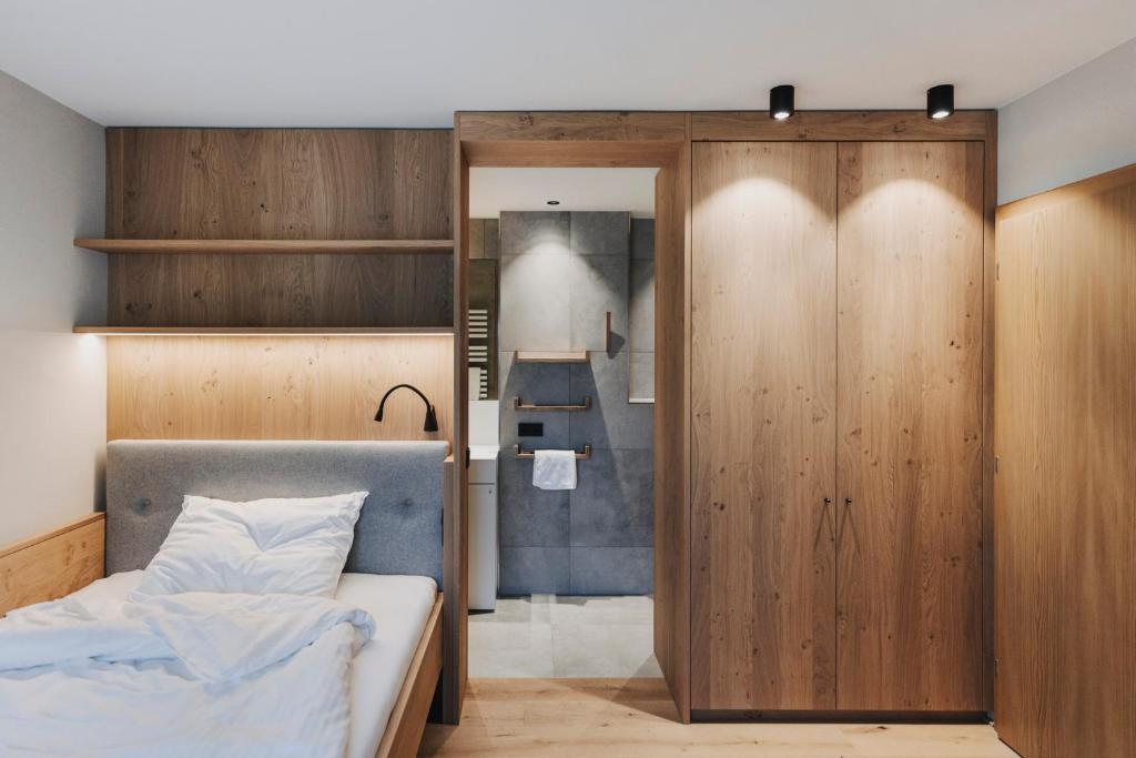 Postel nebo postele na pokoji v ubytování Hotel Alpenrose