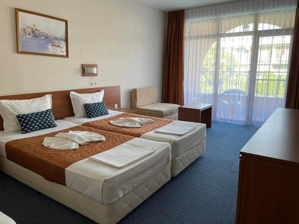 Postel nebo postele na pokoji v ubytování Hotel Liani - All Inclusive