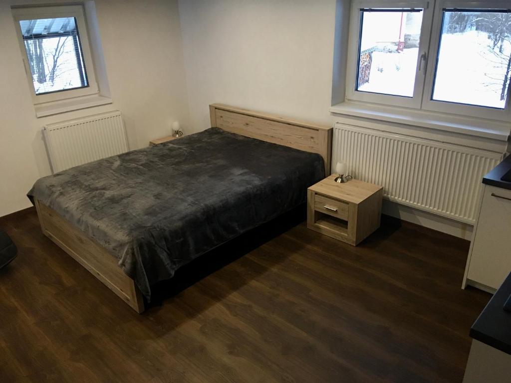 Postel nebo postele na pokoji v ubytování Chalupa pod sjezdovkou