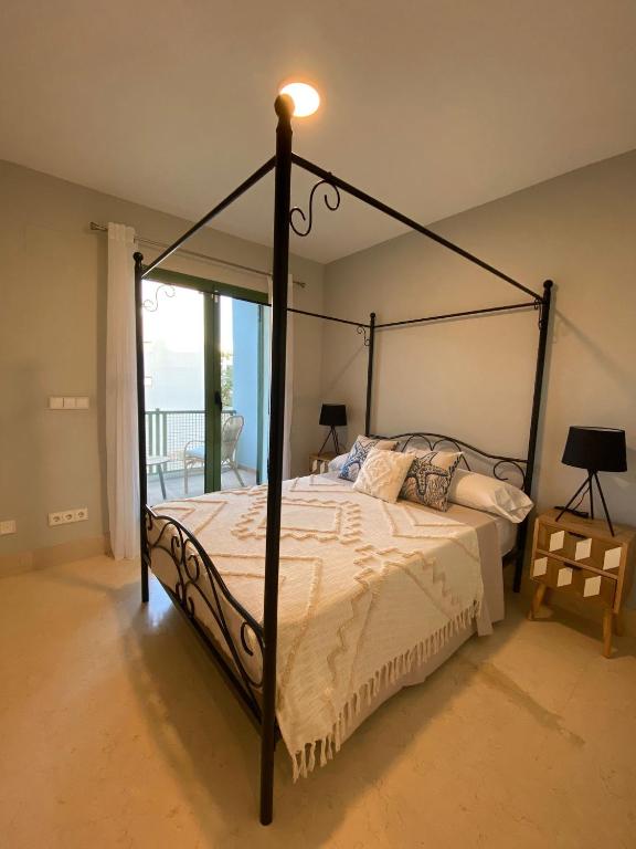 A bed or beds in a room at AIRE DE SOTOGRANDE