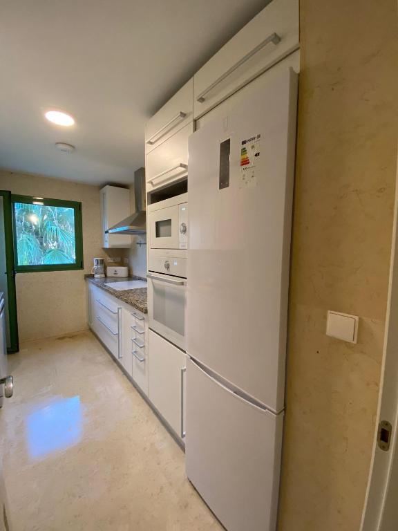 A kitchen or kitchenette at AIRE DE SOTOGRANDE