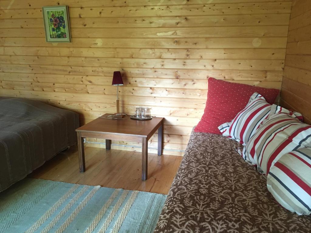 Postel nebo postele na pokoji v ubytování Voosemetsa Turismitalu