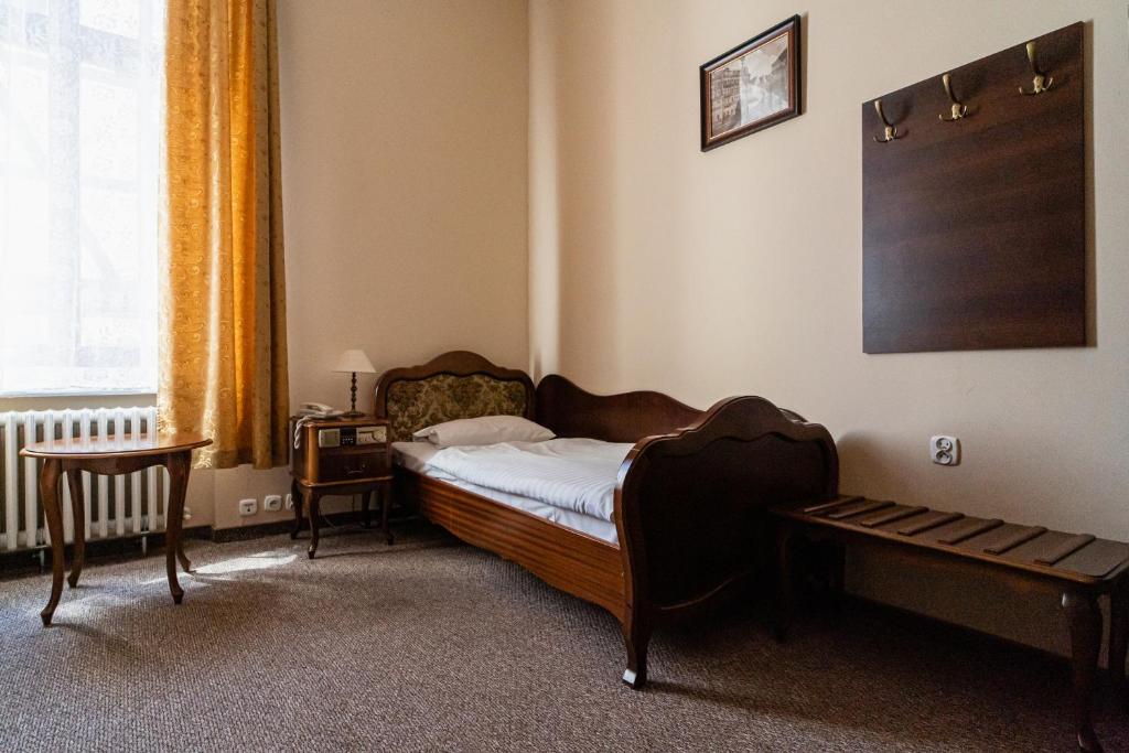 Postel nebo postele na pokoji v ubytování Hotel Polonia