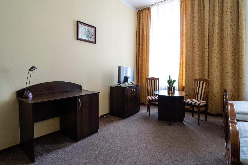 Postel nebo postele na pokoji v ubytování Hotel Polonia