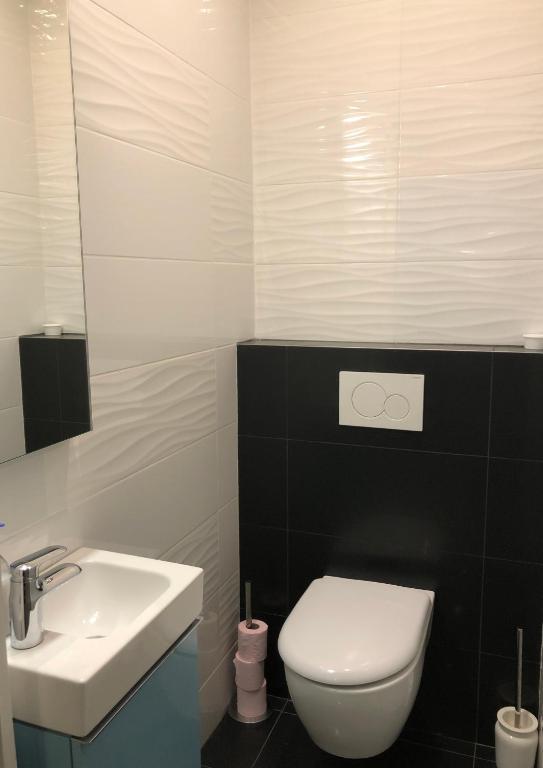 Kúpeľňa v ubytovaní Elégant appartement dans le quartier Concorde à Paris