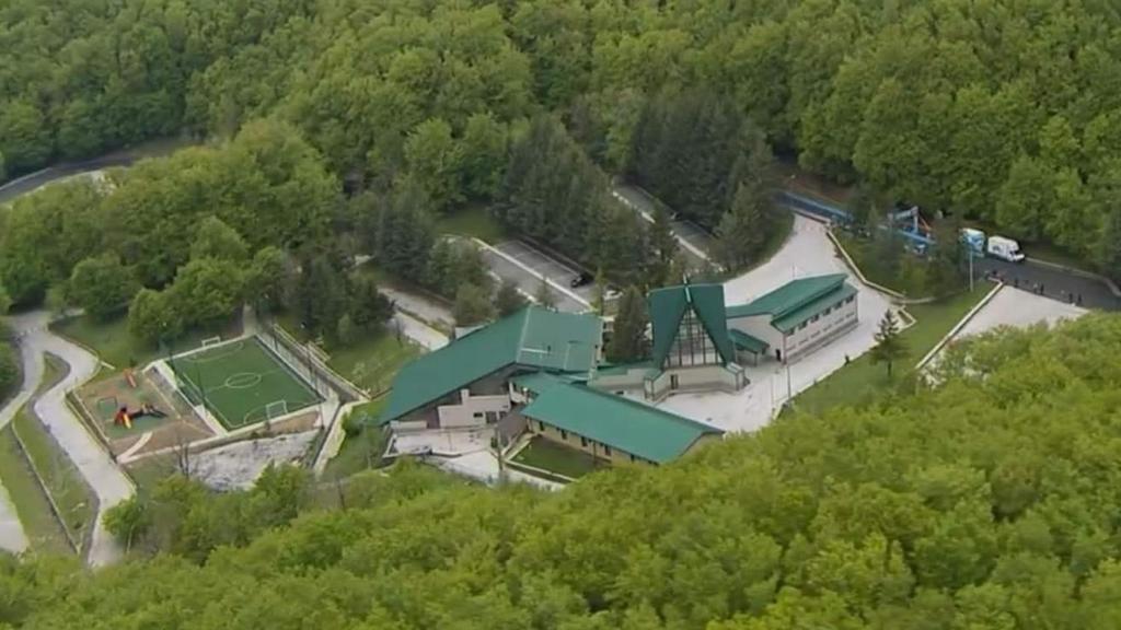 an aerial view of a park with a building at Chalet Madonna di Viggiano in Viggiano