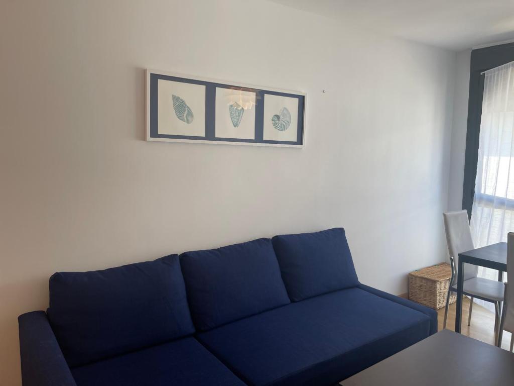 Posezení v ubytování Relájate en Ramales de la Victoria, apartamento con piscina y parking