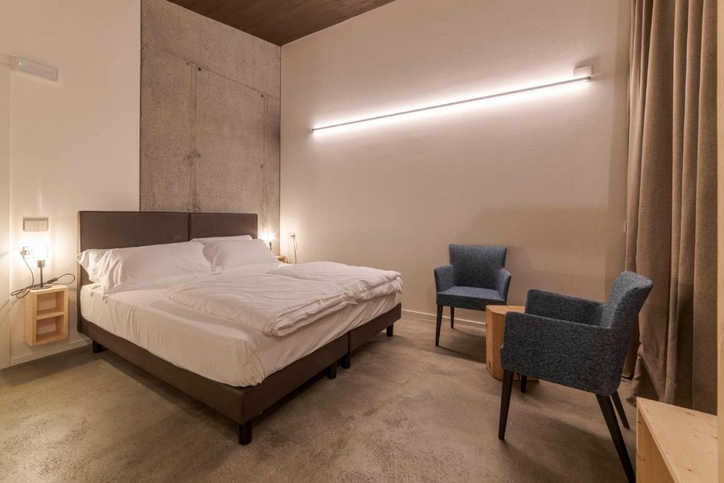 Postel nebo postele na pokoji v ubytování Agriturismo B&B Caffè e Vino