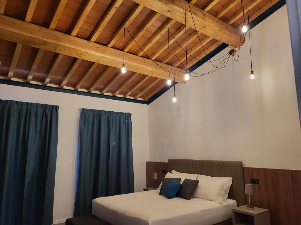Postel nebo postele na pokoji v ubytování G&G Firenze Apartment
