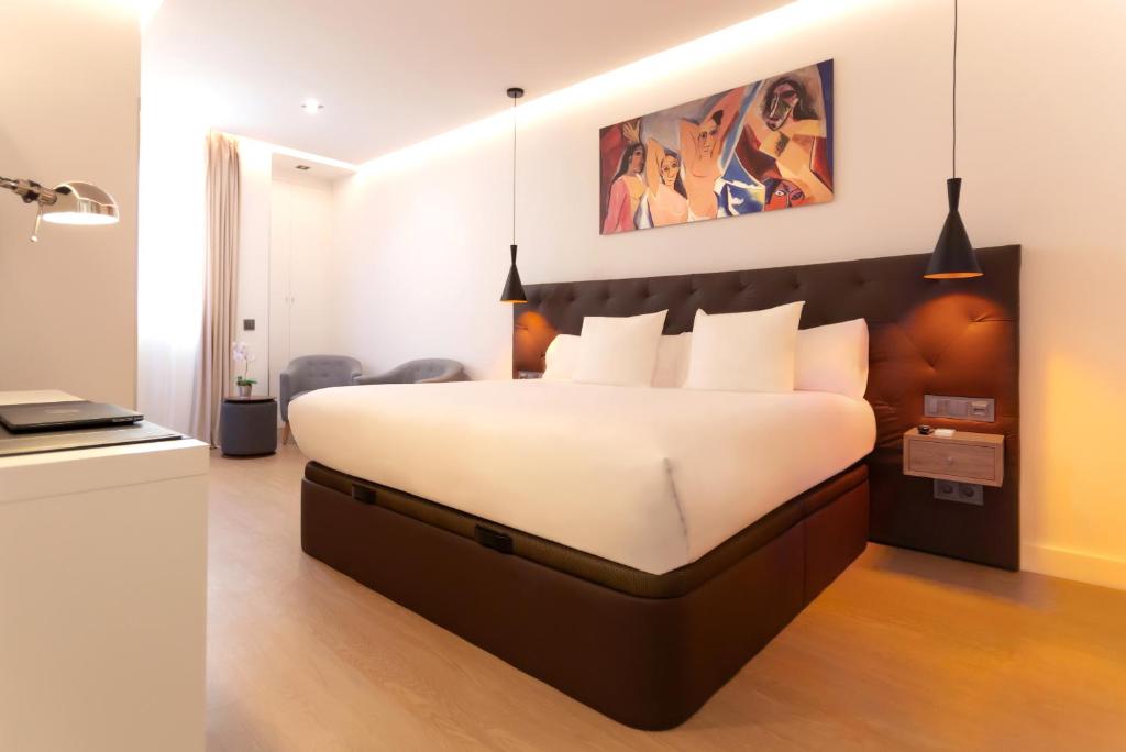 Posteľ alebo postele v izbe v ubytovaní Woohoo Rooms Boutique Sol