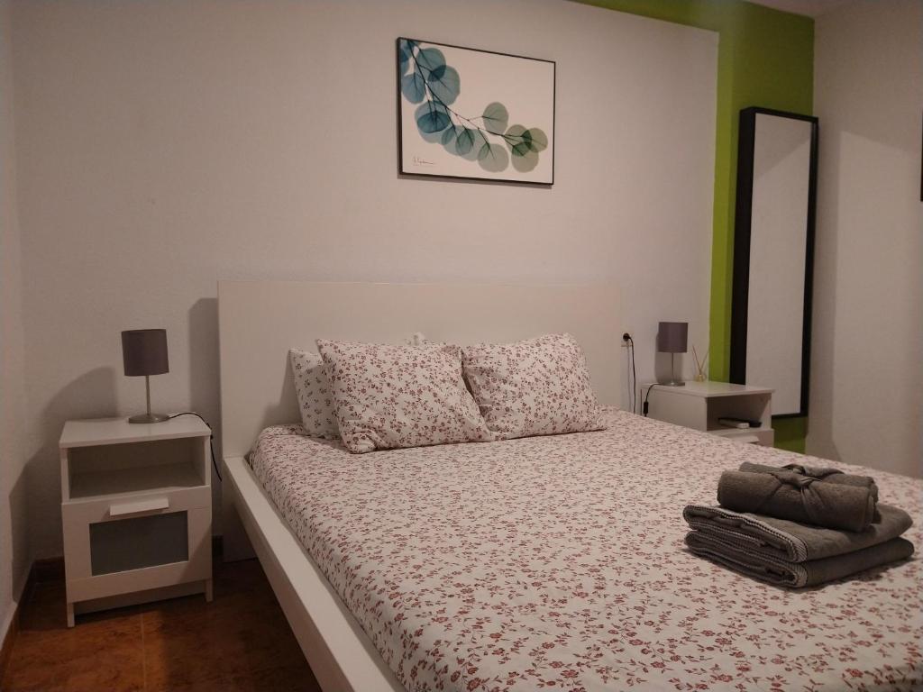 Postel nebo postele na pokoji v ubytování Coqueto miniapartamento junto centro Torremolinos