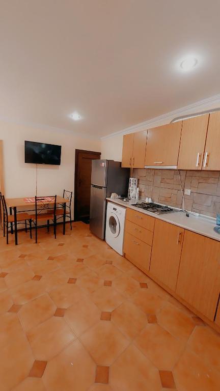 Kuchyň nebo kuchyňský kout v ubytování Buddha apartment