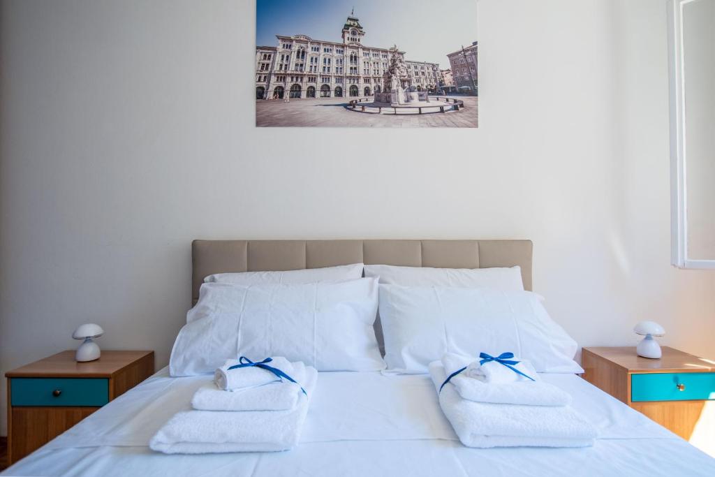 Posteľ alebo postele v izbe v ubytovaní CASA VIALE XX SETTEMBRE