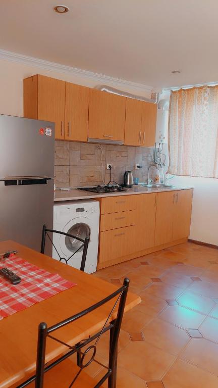 Kuchyň nebo kuchyňský kout v ubytování Buddha apartment