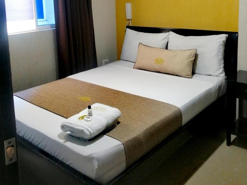 Postel nebo postele na pokoji v ubytování Hotel Chico Real