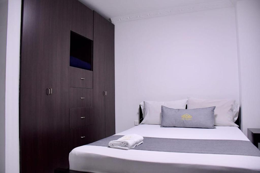 Postel nebo postele na pokoji v ubytování Hotel Chico Real