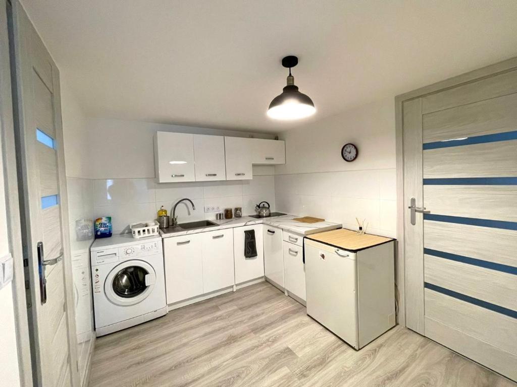 Kuchyňa alebo kuchynka v ubytovaní B&J Apartament Międzyzdroje