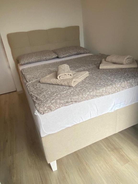 Postel nebo postele na pokoji v ubytování SMILJANA