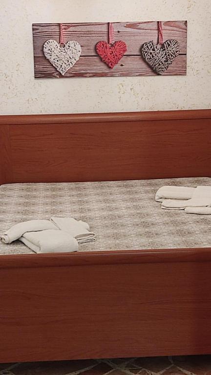 A bed or beds in a room at La Dolce Oasi
