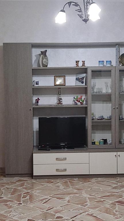 A television and/or entertainment centre at La Dolce Oasi