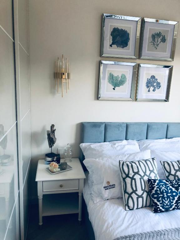 Posteľ alebo postele v izbe v ubytovaní Serce miasta Gdansk apartament