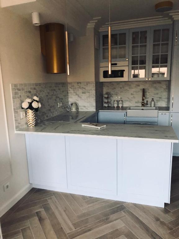 Kuchyňa alebo kuchynka v ubytovaní Serce miasta Gdansk apartament