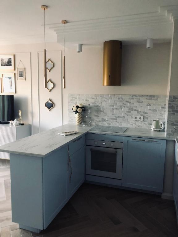 Kuchyňa alebo kuchynka v ubytovaní Serce miasta Gdansk apartament