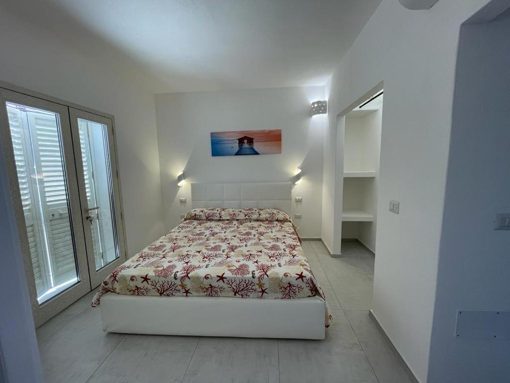 Łóżko lub łóżka w pokoju w obiekcie Villa GEGI