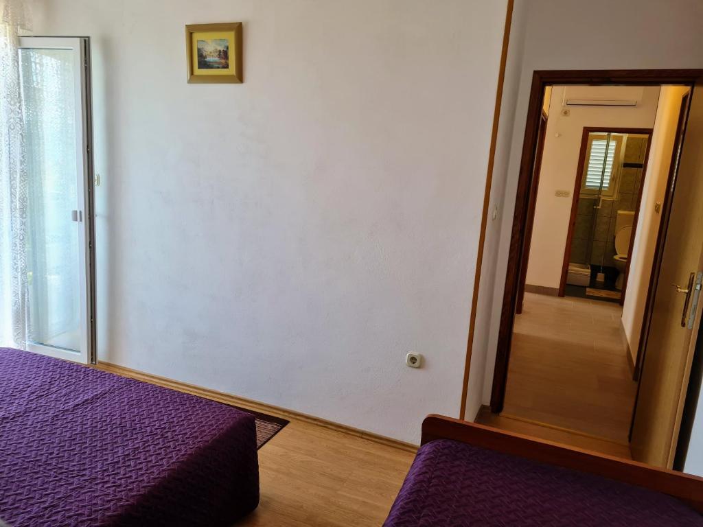 Postel nebo postele na pokoji v ubytování Angel