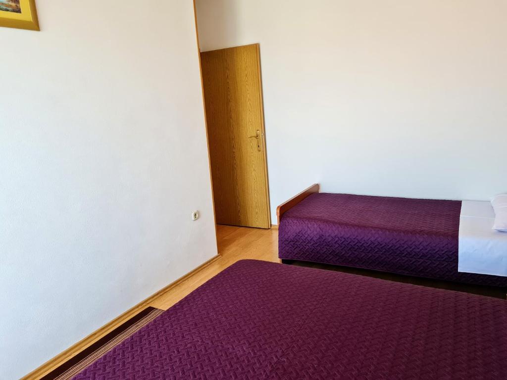 Postel nebo postele na pokoji v ubytování Angel