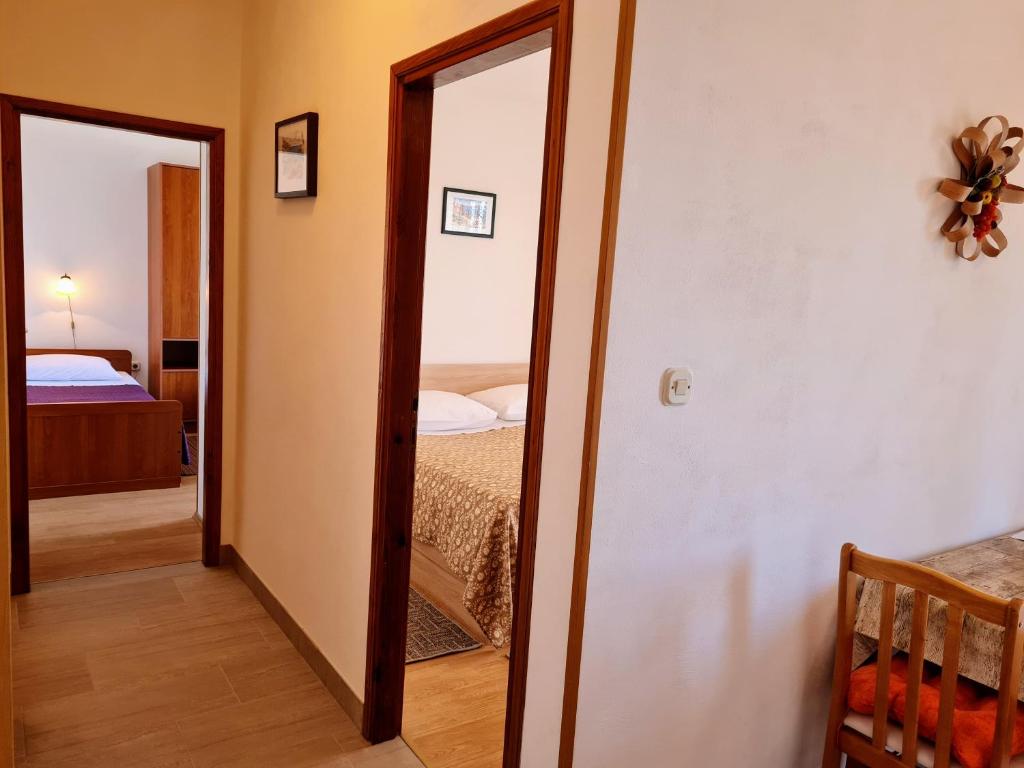 Postel nebo postele na pokoji v ubytování Angel