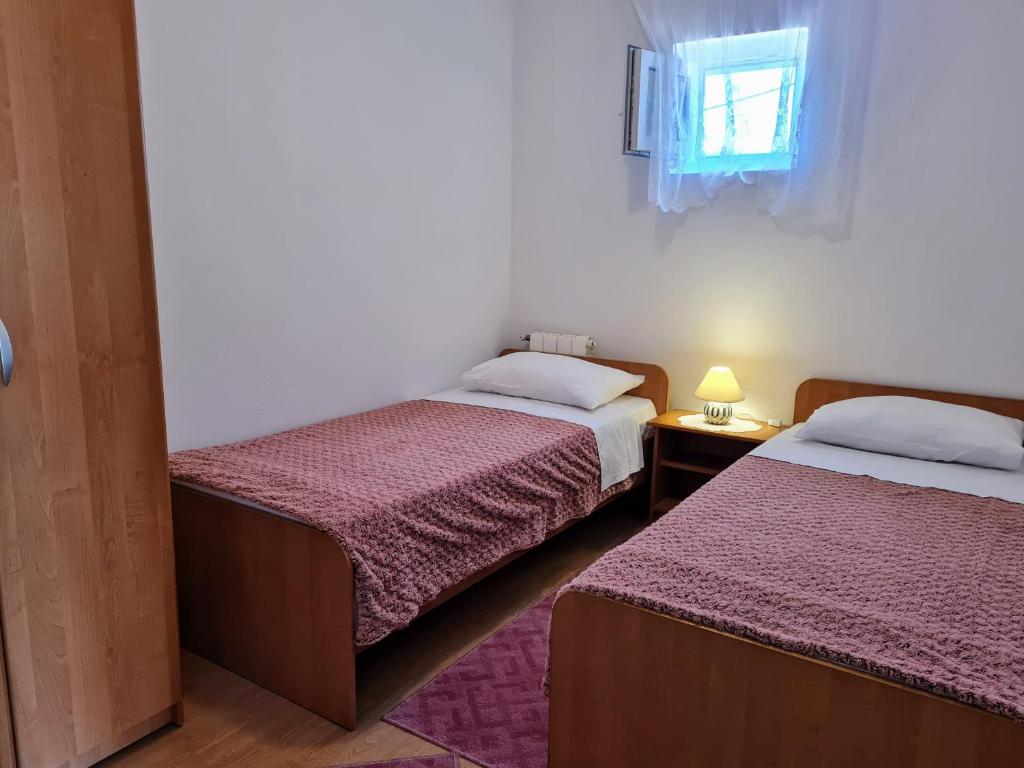 Postel nebo postele na pokoji v ubytování Angel