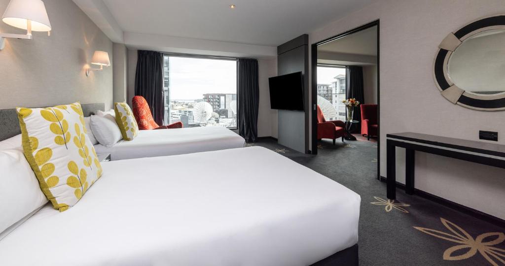 Voodi või voodid majutusasutuse SkyCity Hotel Auckland toas