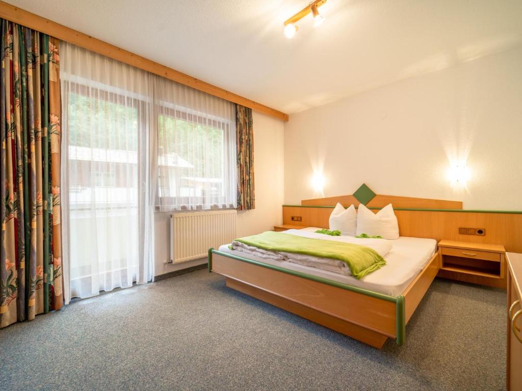 Postel nebo postele na pokoji v ubytování Haus Christoph