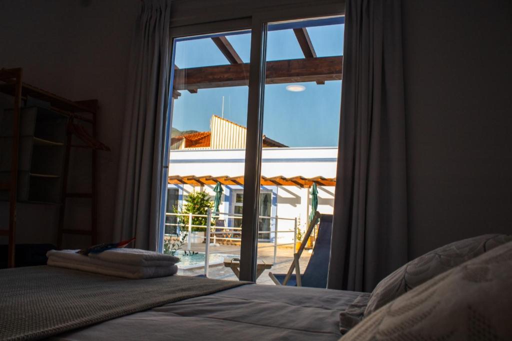 Postel nebo postele na pokoji v ubytování Apartamentos Atenea Jerte